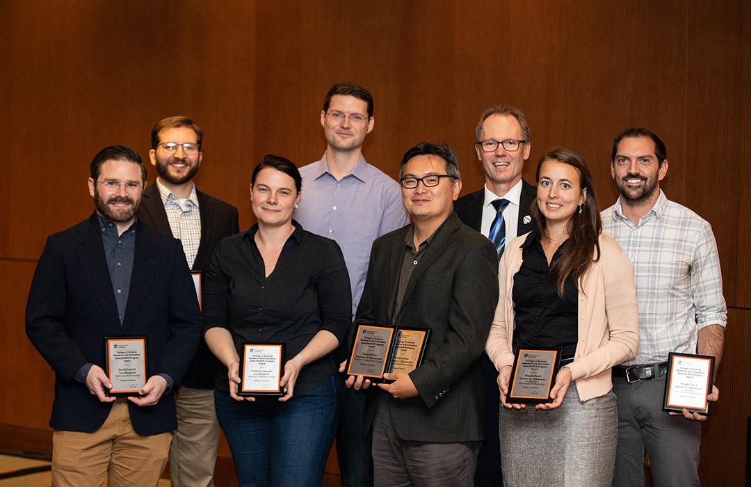 Koslicki, Loesgen, Chan, David and Hokanson receiving awards together