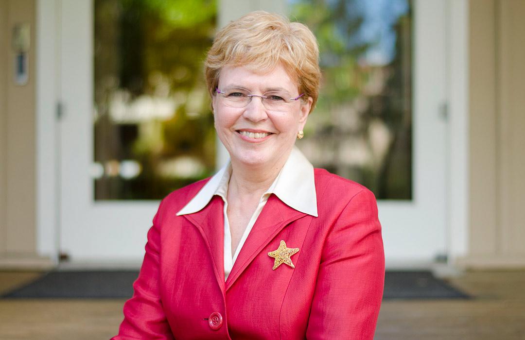 Jane Lubchenco sitting outdoors