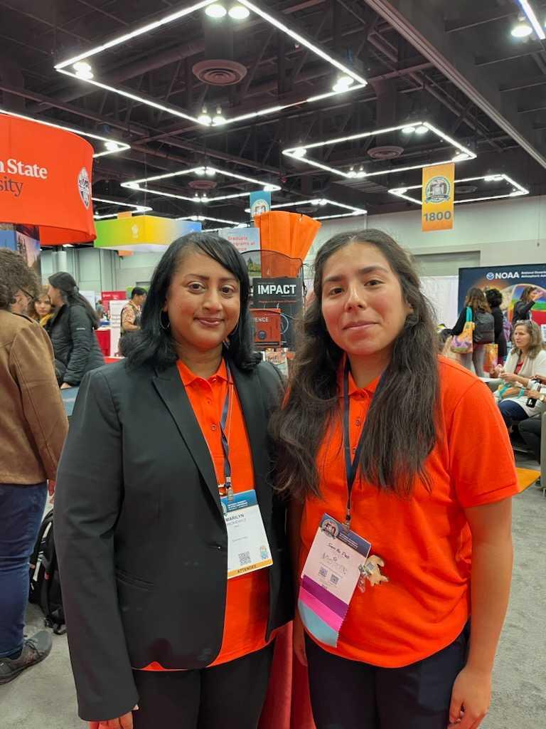 Associate Chemistry Professor Marilyn Mackiewicz (left) and Citlali Nieves Lira (right), a chemistry undergraduate student exploring the conference.