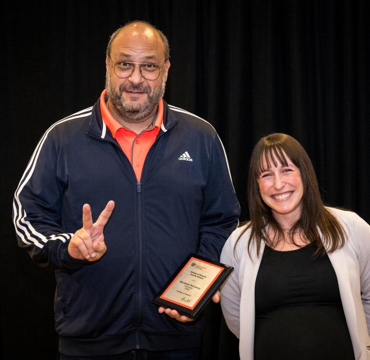 Kyriakos Stylianou poses for a photo and receives his award at the 2024 Winter Awards Ceremony at Oregon State University.
