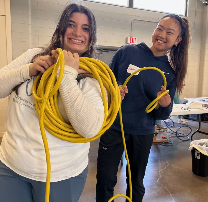 Students pose for a picture during free dental event.